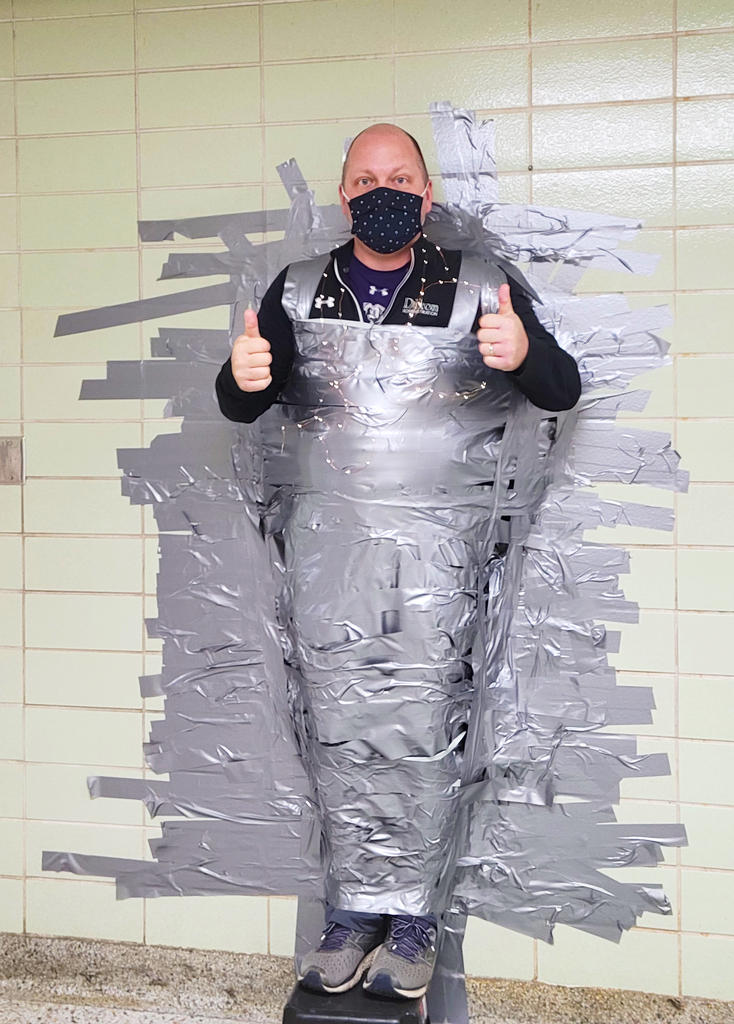 Mr Sagel Duct  taped to the wall