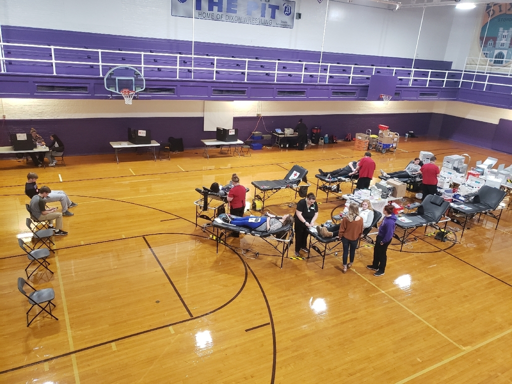 photo of blood donation tables and donors