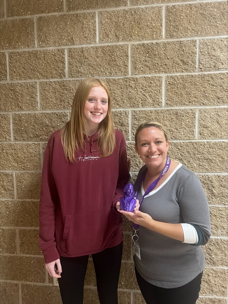 High School student presenting 3D print to the Madison Assistant Principal